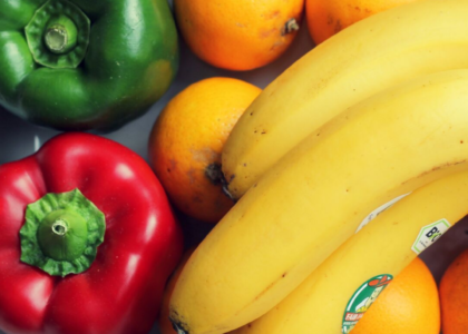 Healthy food: bananas, oranges and peppers